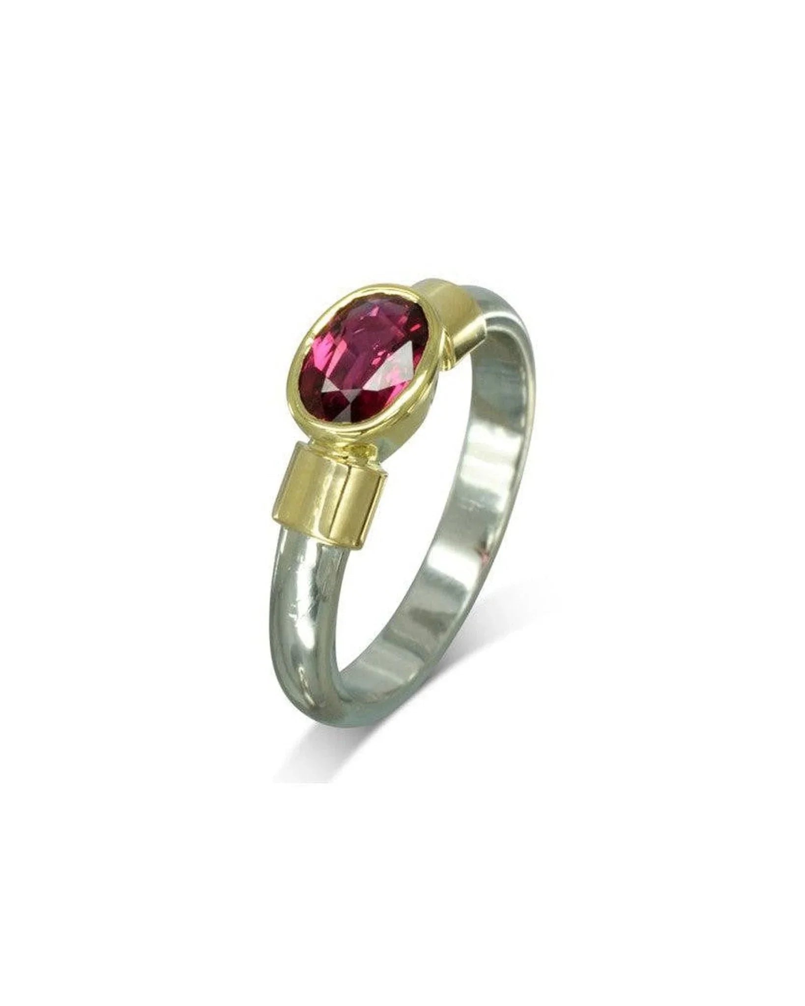 Silver and 18ct yellow gold ring with an oval ruby solitaire.