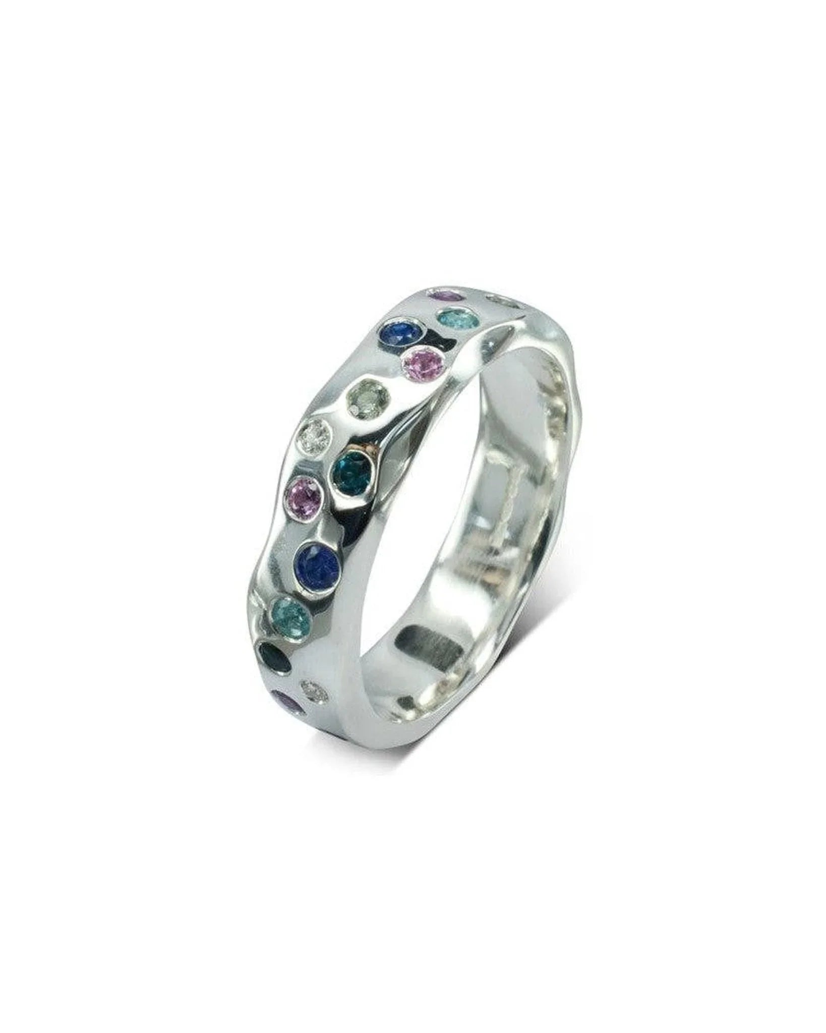 Handmade hammered silver eternity ring with blue sapphires and diamonds in organic design
