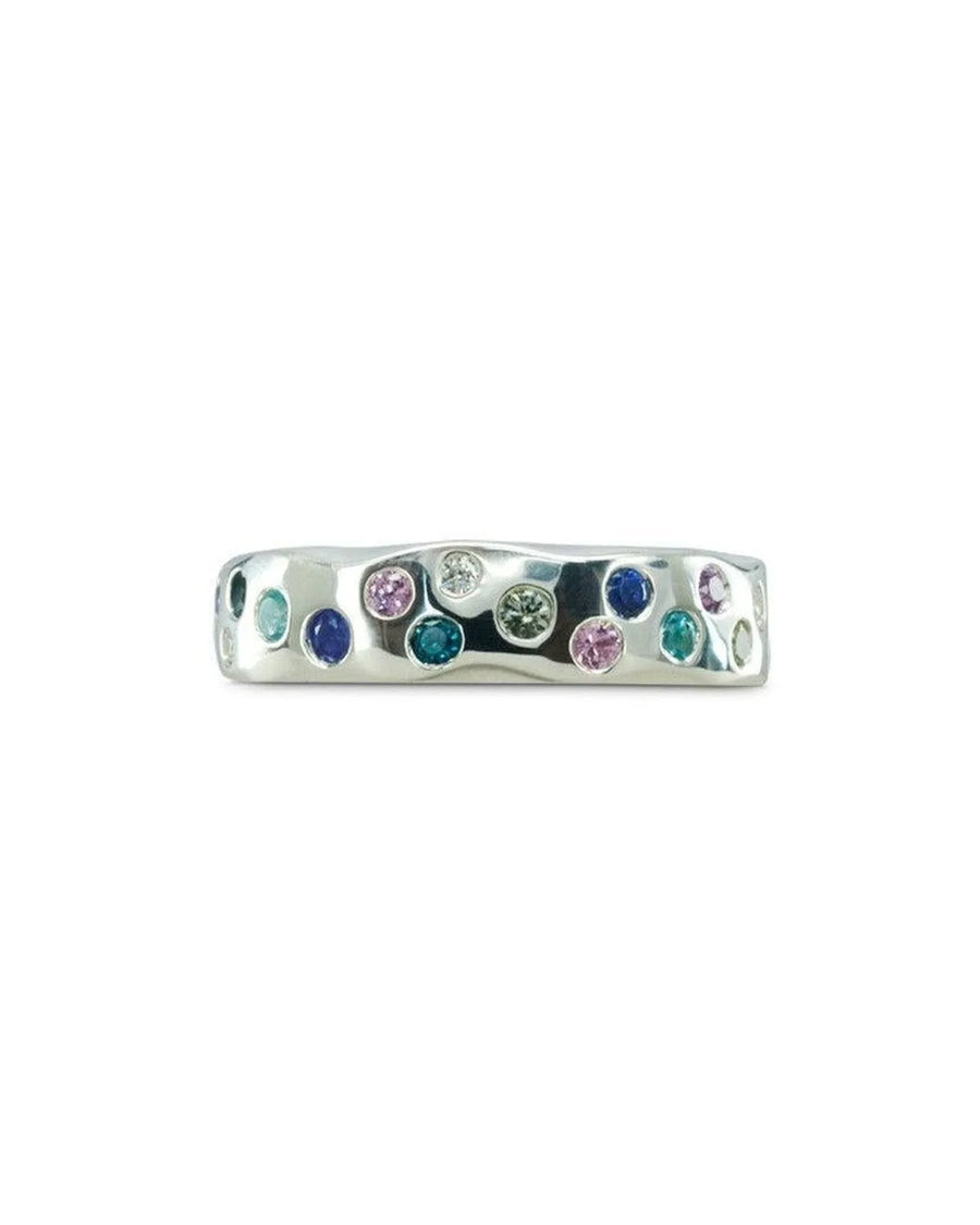 Silver side hammered eternity ring with colorful round gemstones.