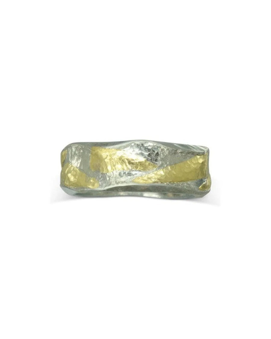Hammered mixed metal ring with textured platinum and gold, organic design on white background