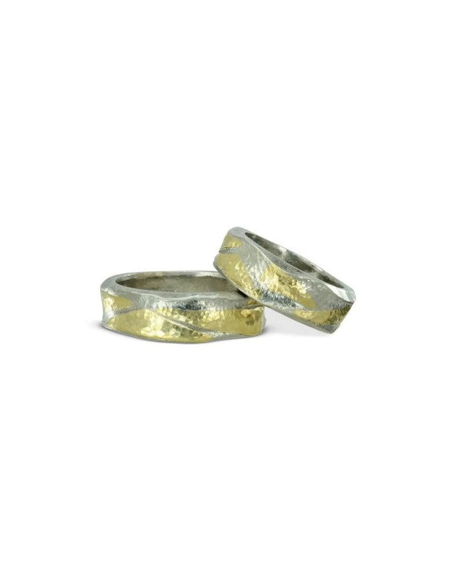 Hammered platinum and gold mixed metal rings with textured, organic finish