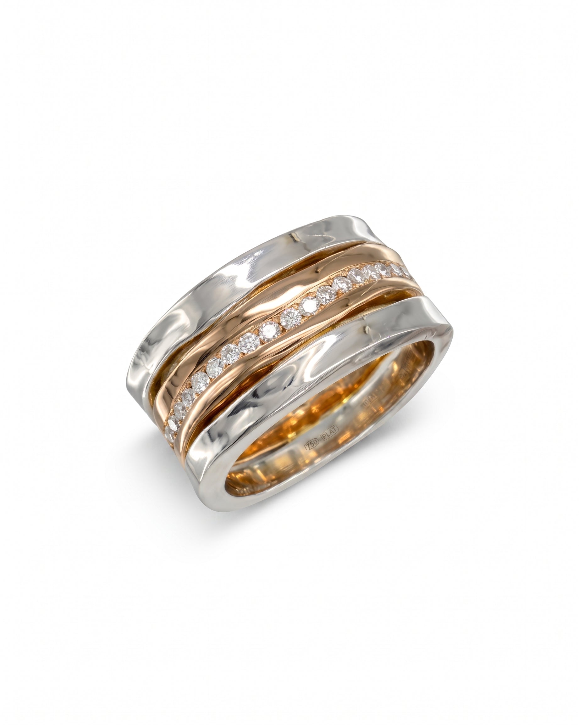Side hammered platinum and rose gold eternity ring with diamonds.