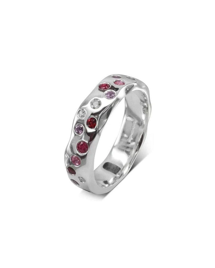 Silver side hammered eternity ring with ruby, pink sapphire, and diamond gemstones.