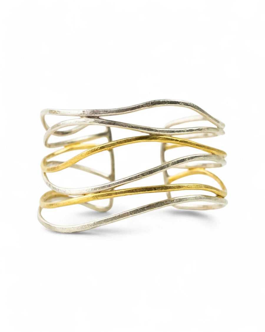 Handmade six-strand cuff bangle with intertwined solid silver and gold bands