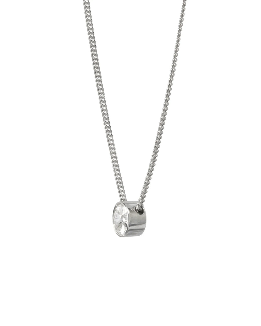 Silver chain necklace featuring a round bezel-set diamond pendant on a white background.