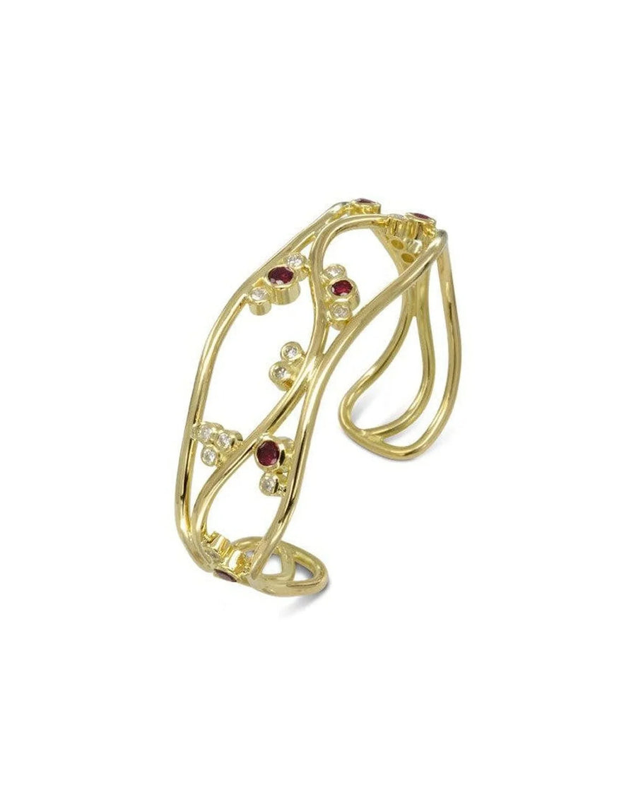 Three-strand yellow gold cuff bangle with organic curves, set with rubies and diamonds