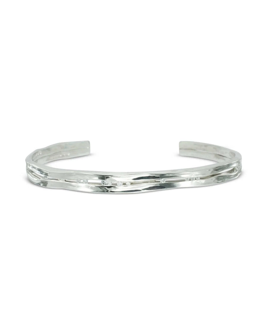 Solid silver and diamond bangle with a textured, open cuff design.