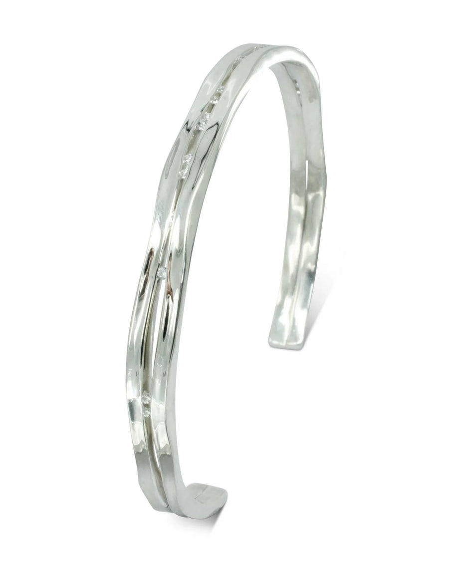 Solid silver cuff bangle with natural diamonds.