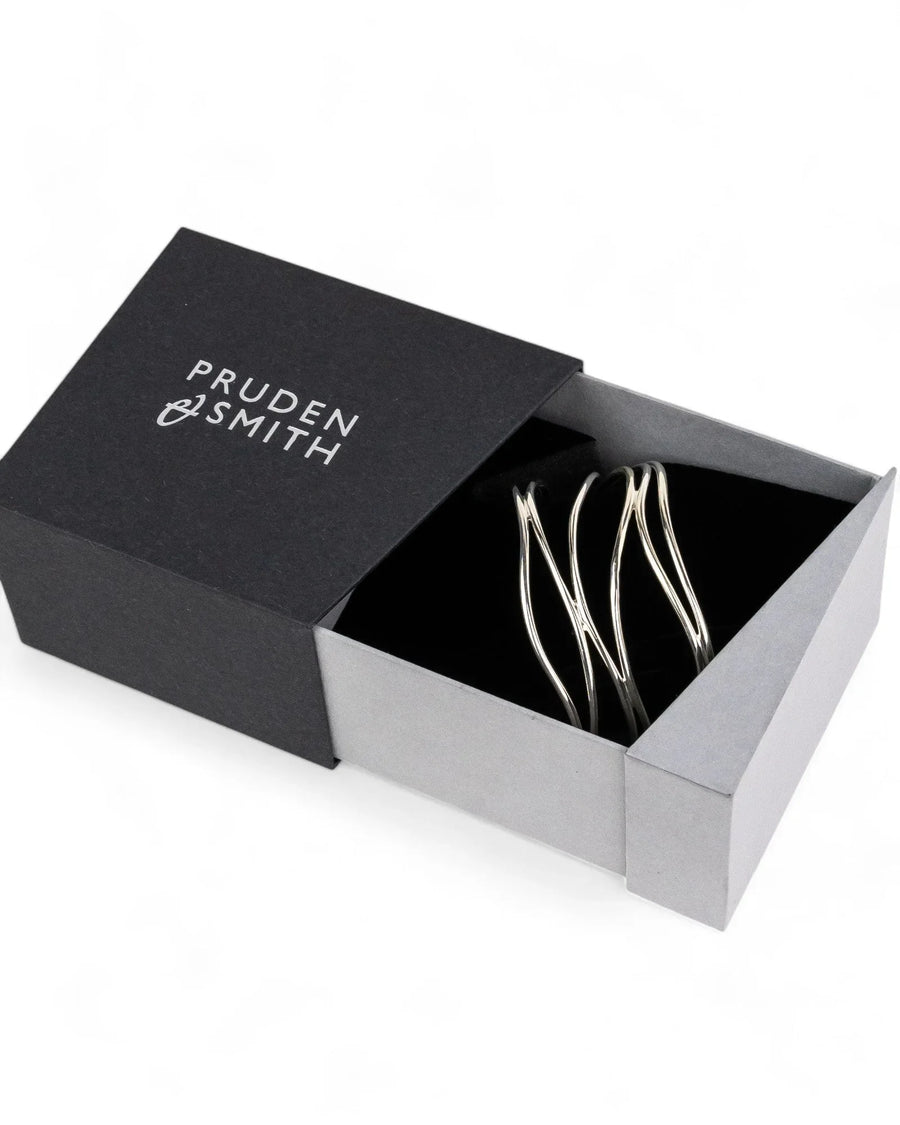 Six strand solid silver cuff bangle with wave design in a gift box