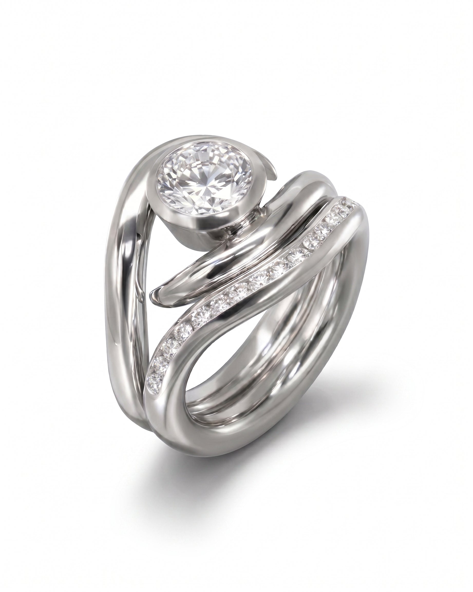 Platinum spiky engagement ring with a round diamond and a diamond-shaped wedding band.