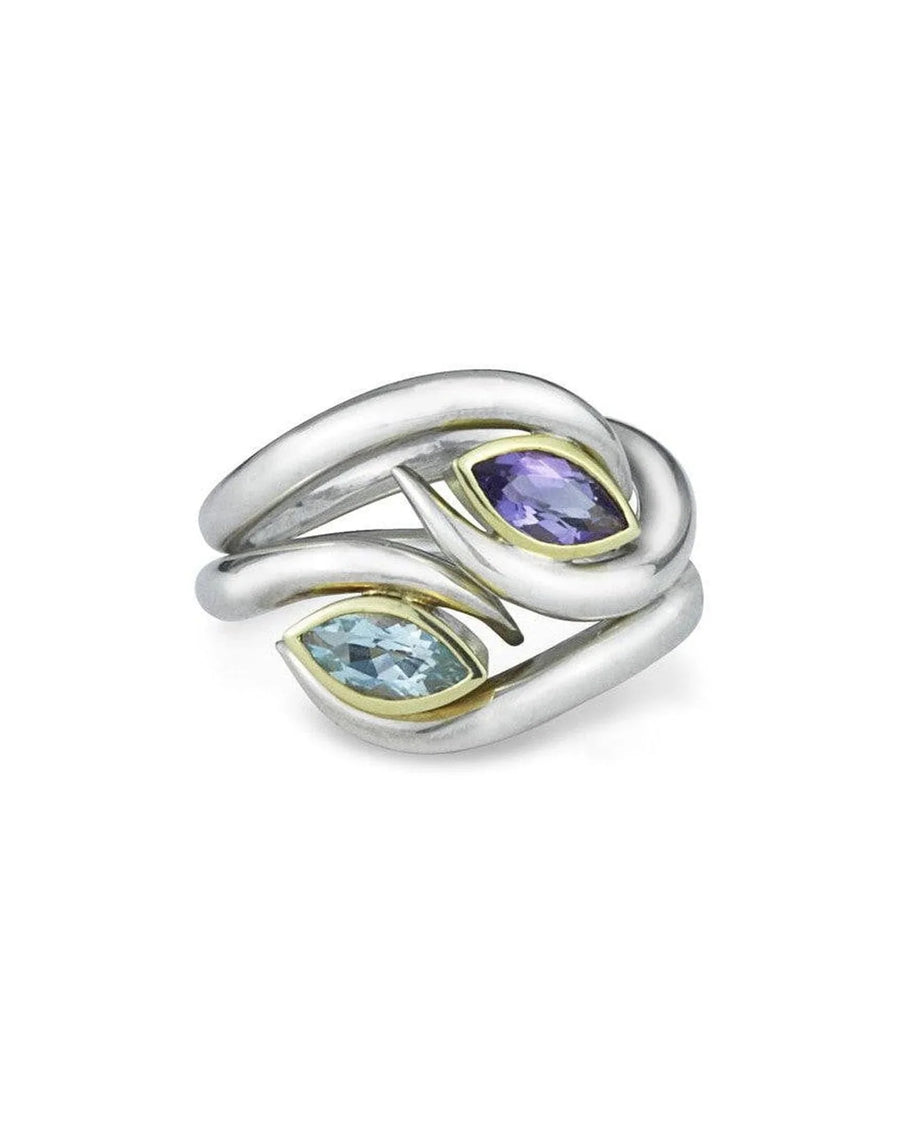 Silver and gold ring with marquise-cut peridot and amethyst gemstones.