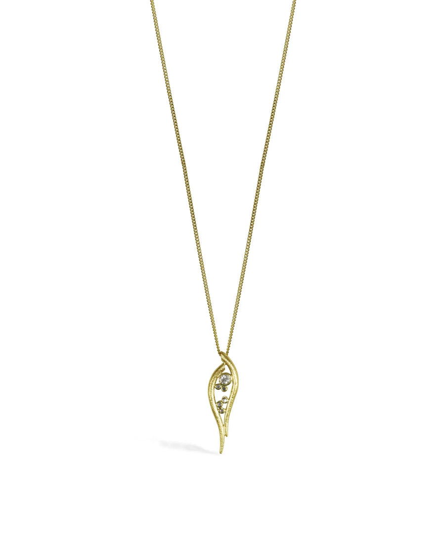 Hammered gold pendant necklace with organic leaf shape and three set diamonds on white background