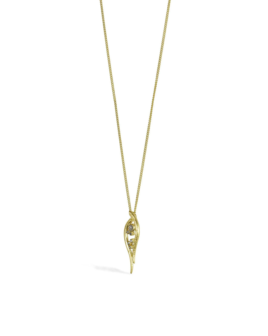 Organic hammered gold pendant necklace with unique sculpted design on white background