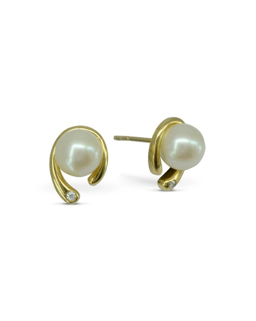 Gold stud earrings with white pearls and small diamonds.