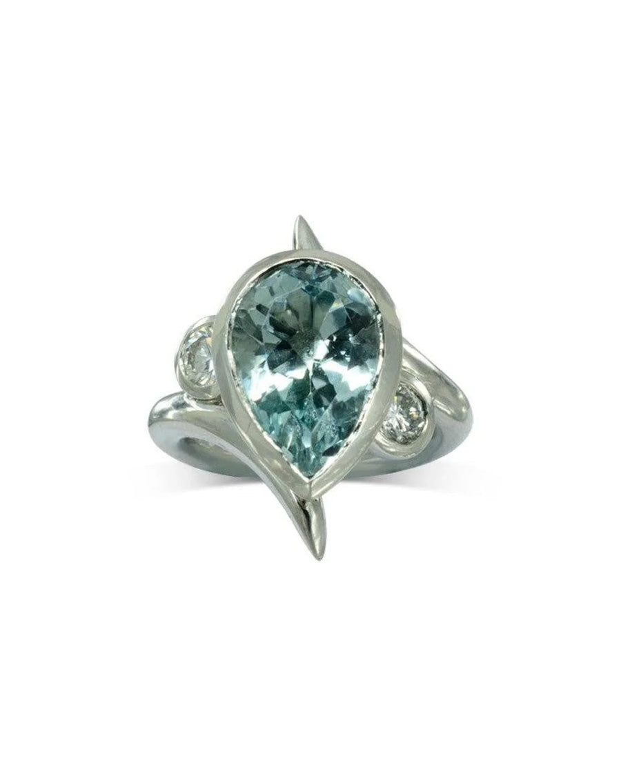 Pear-shaped aquamarine engagement ring with spiky silver setting and diamond accents