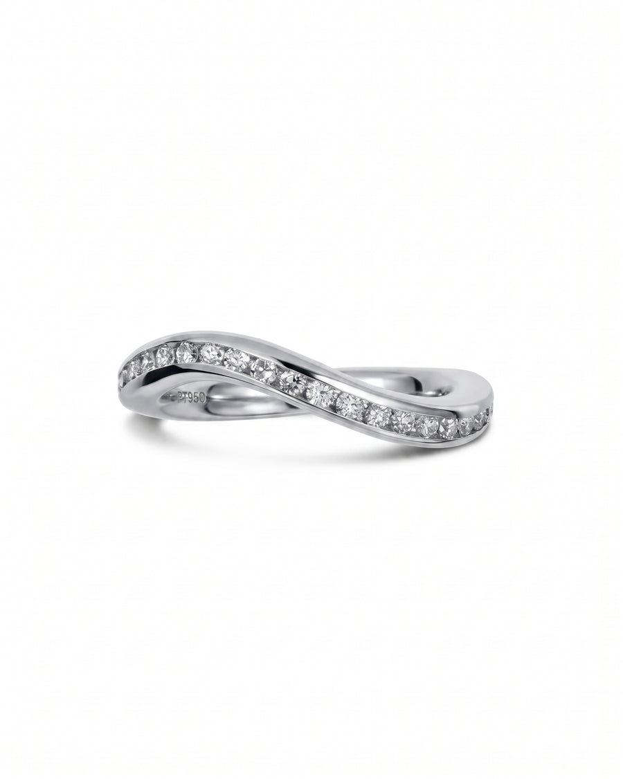 Platinum curved fitted ring with pave diamonds.