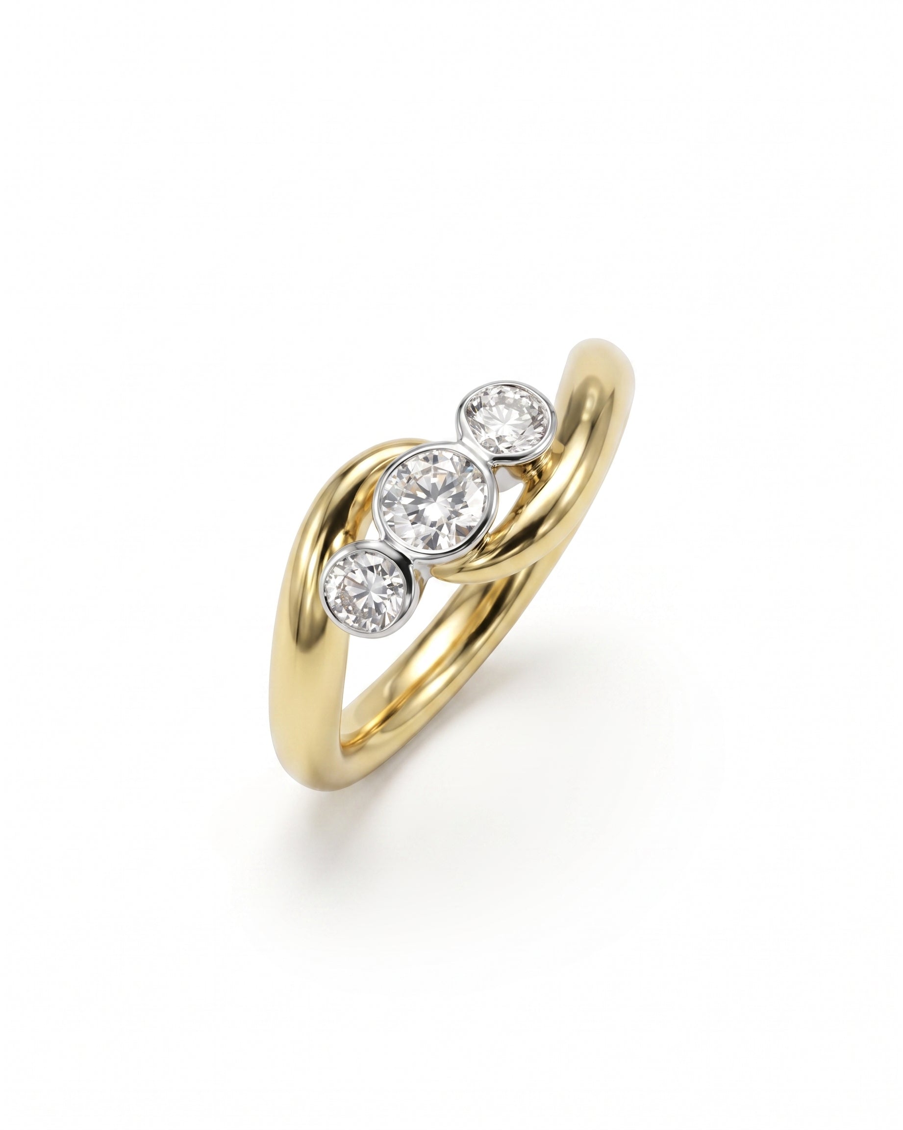 Gold engagement ring with three round diamonds in a spiky trilogy design.
