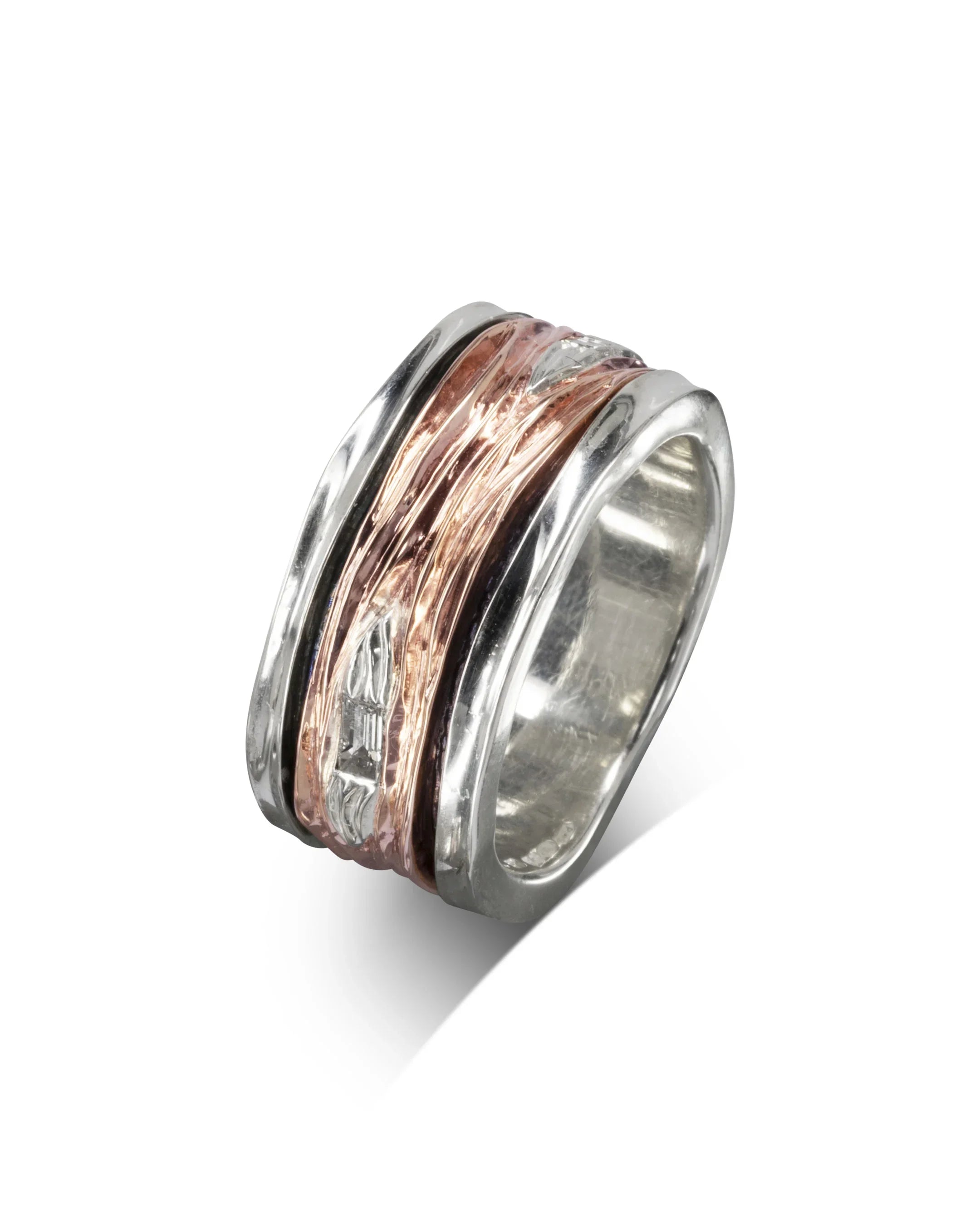 Rose gold and silver spinning ring with baguette cut diamonds.