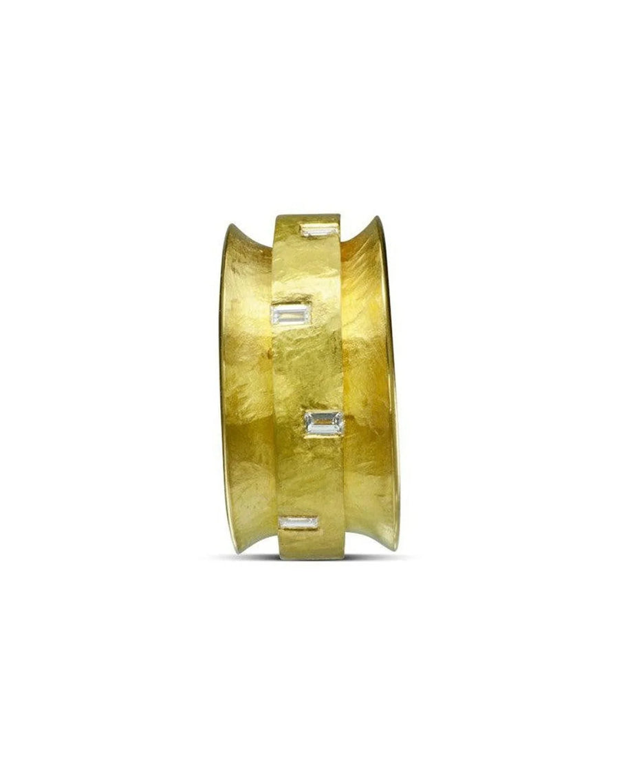 Spinning yellow gold baguette cut diamond eternity ring.