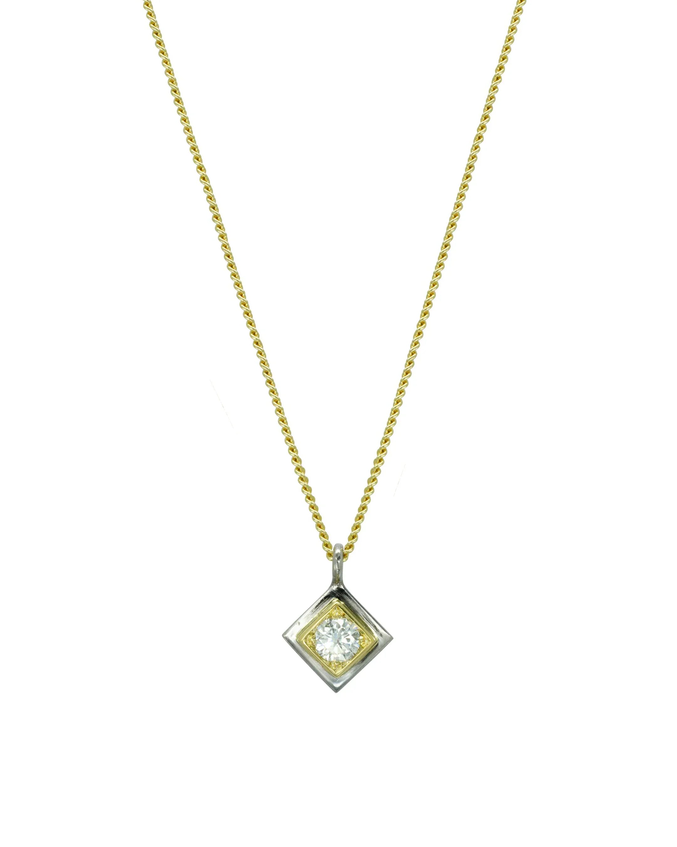 Two-tone gold diamond pendant necklace with square setting on a fine chain