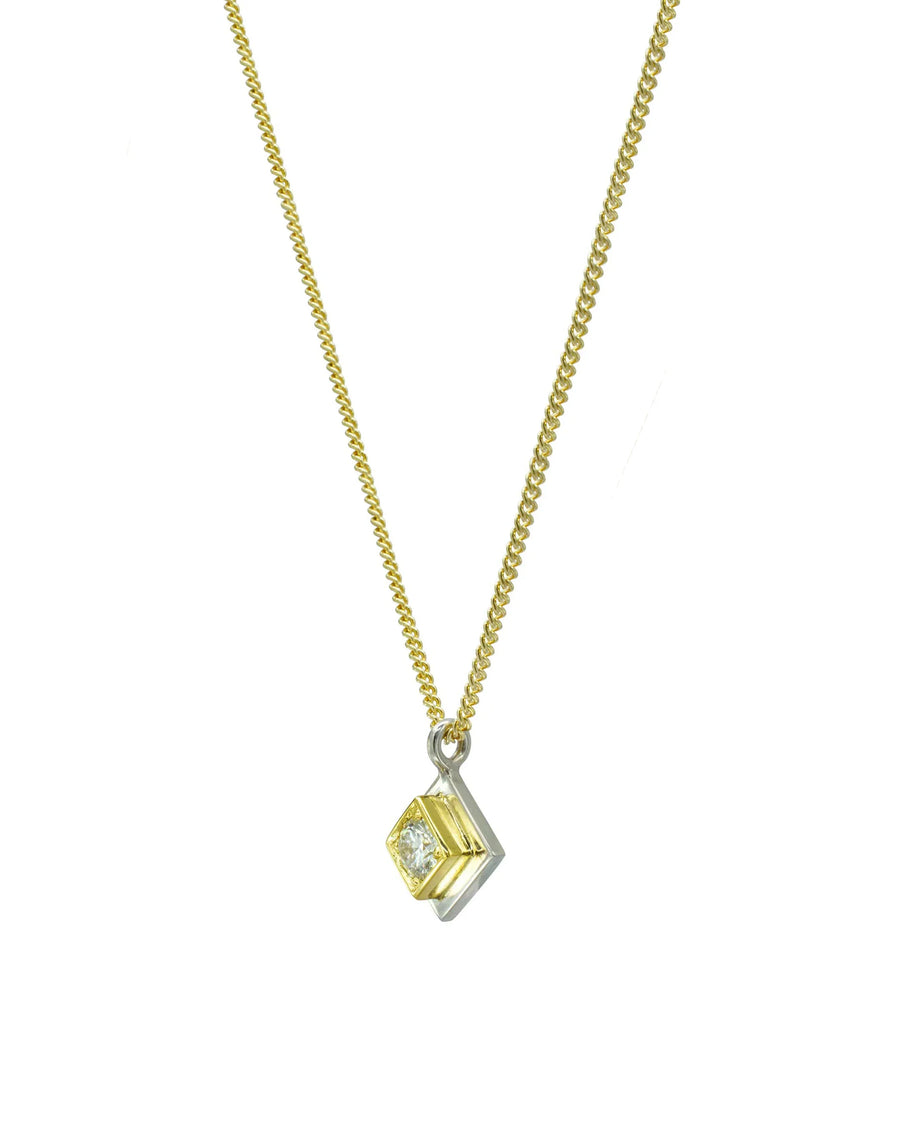 Two-tone gold diamond pendant necklace with modern geometric design on a gold chain