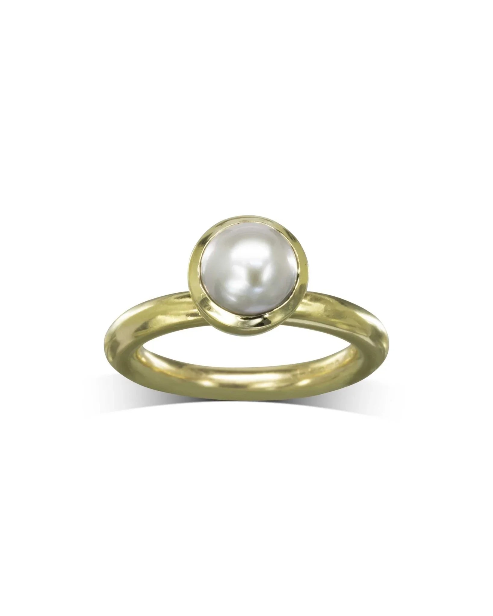 Gold ring with a single round white pearl.