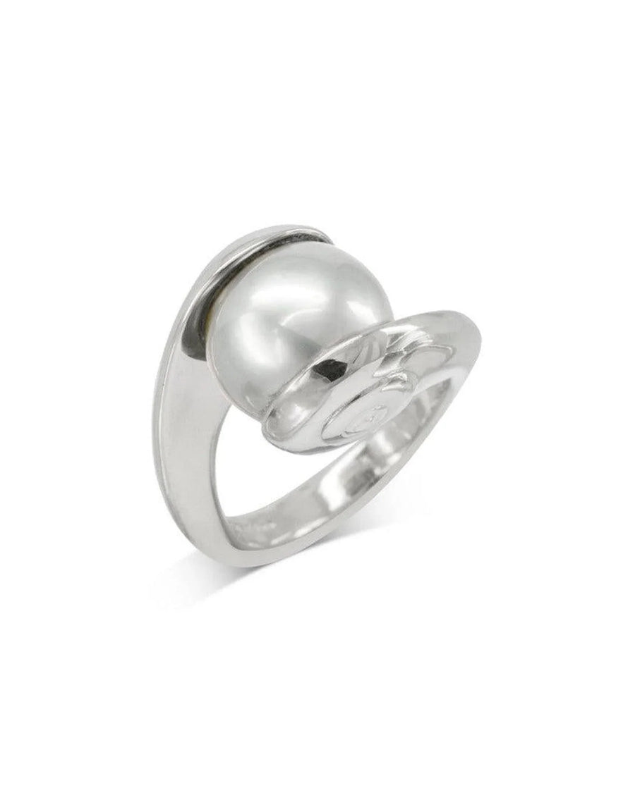 Modern silver ring with a large white pearl and unique spiral band design