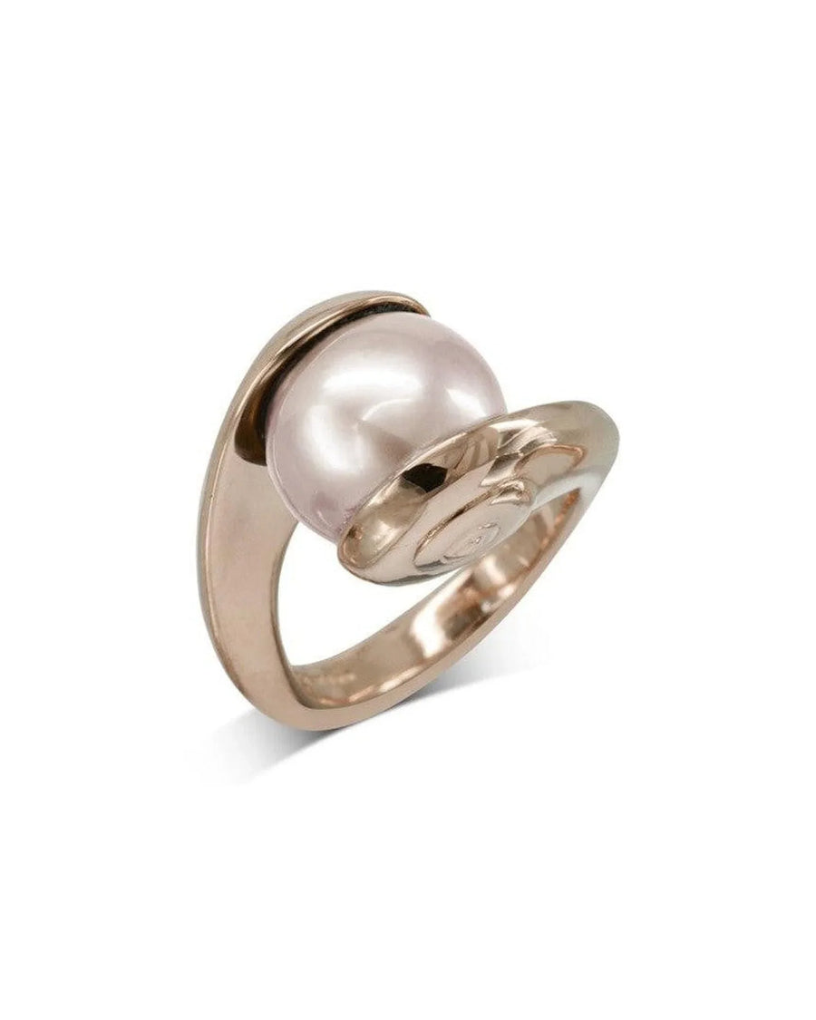 Gold ring featuring a suspended pink pearl with a modern, sculptural design