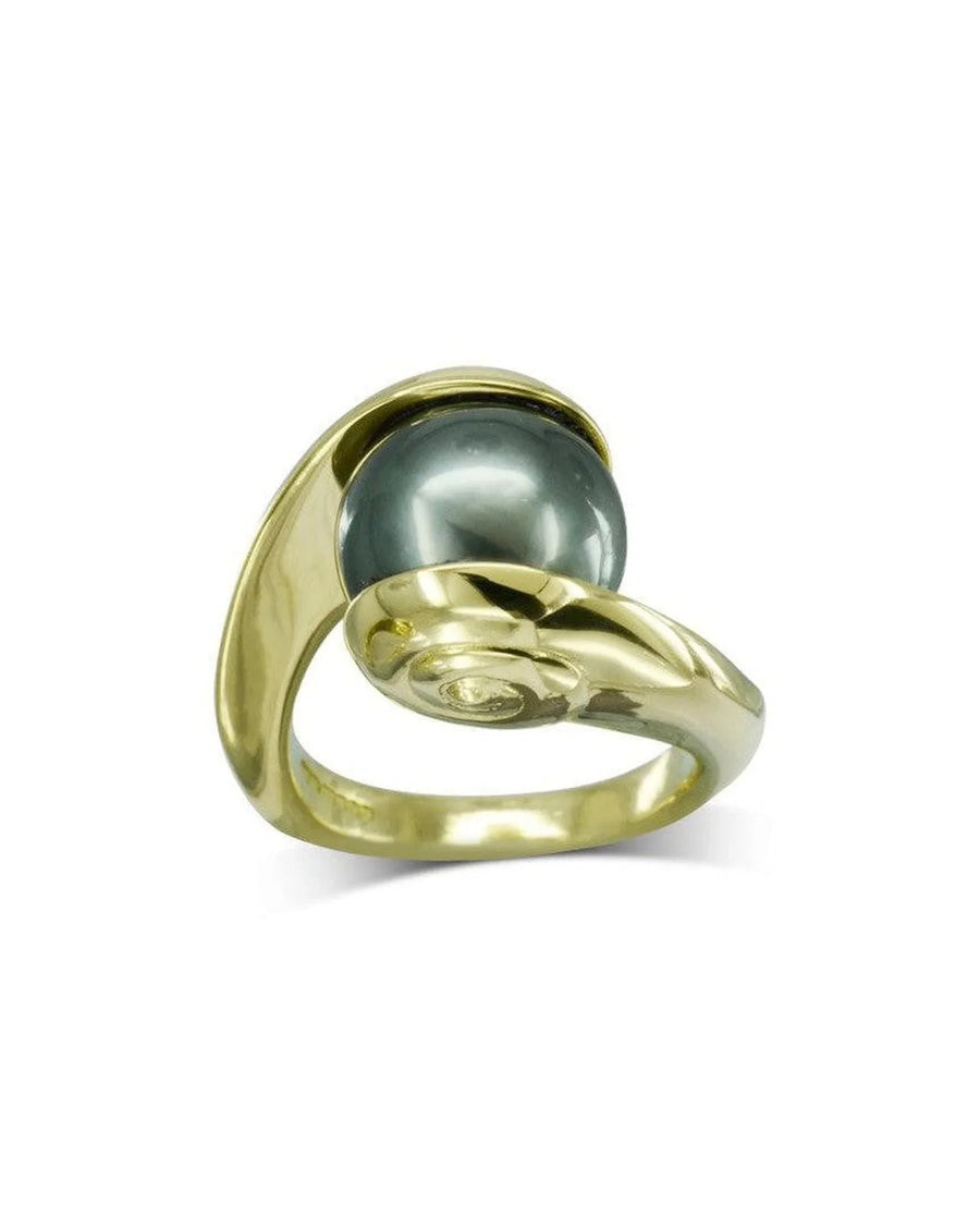 Yellow gold ring with a dark Tahitian pearl in a modern, swirling organic design