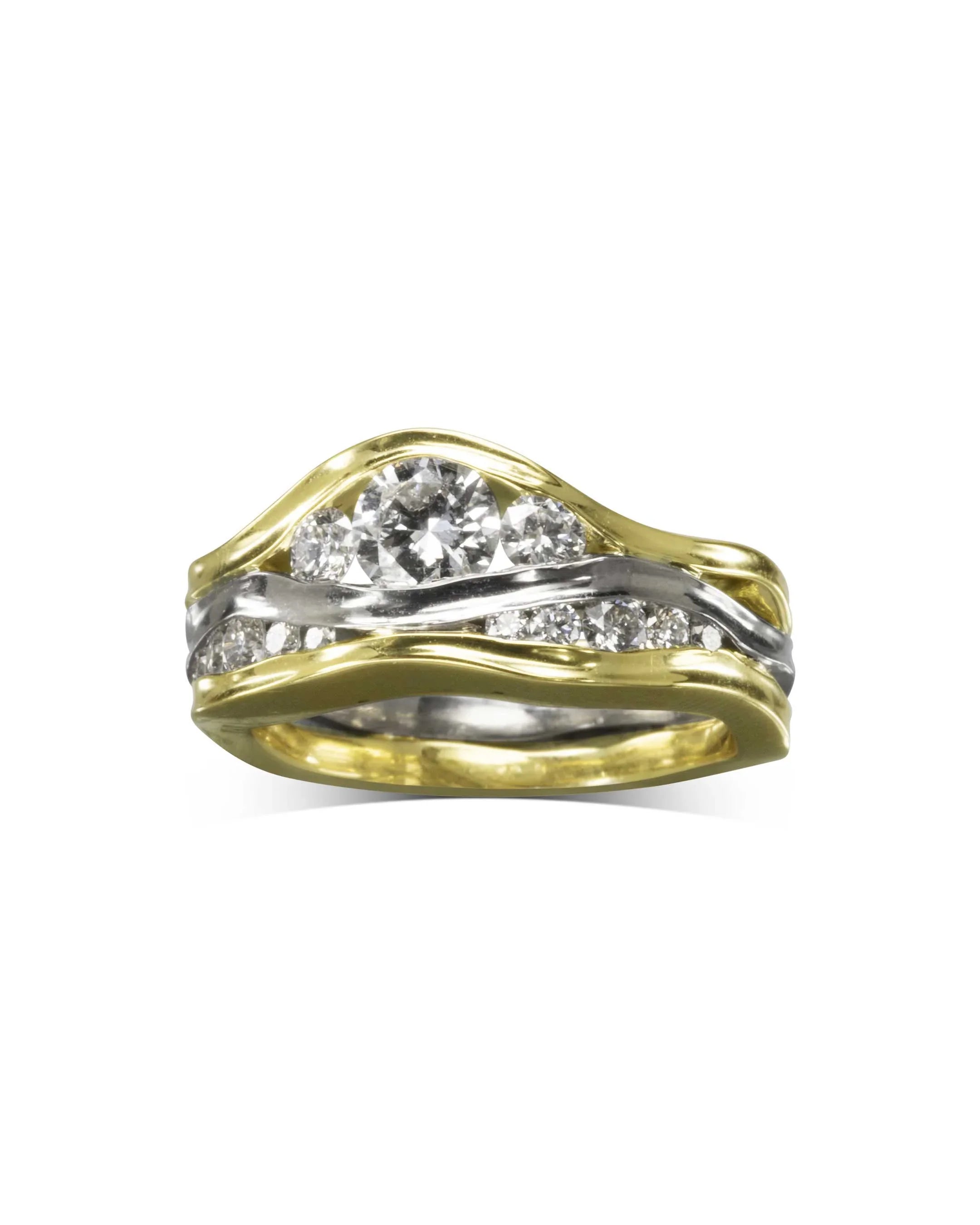 Three band 9ct white and yellow gold trap ring with diamonds.