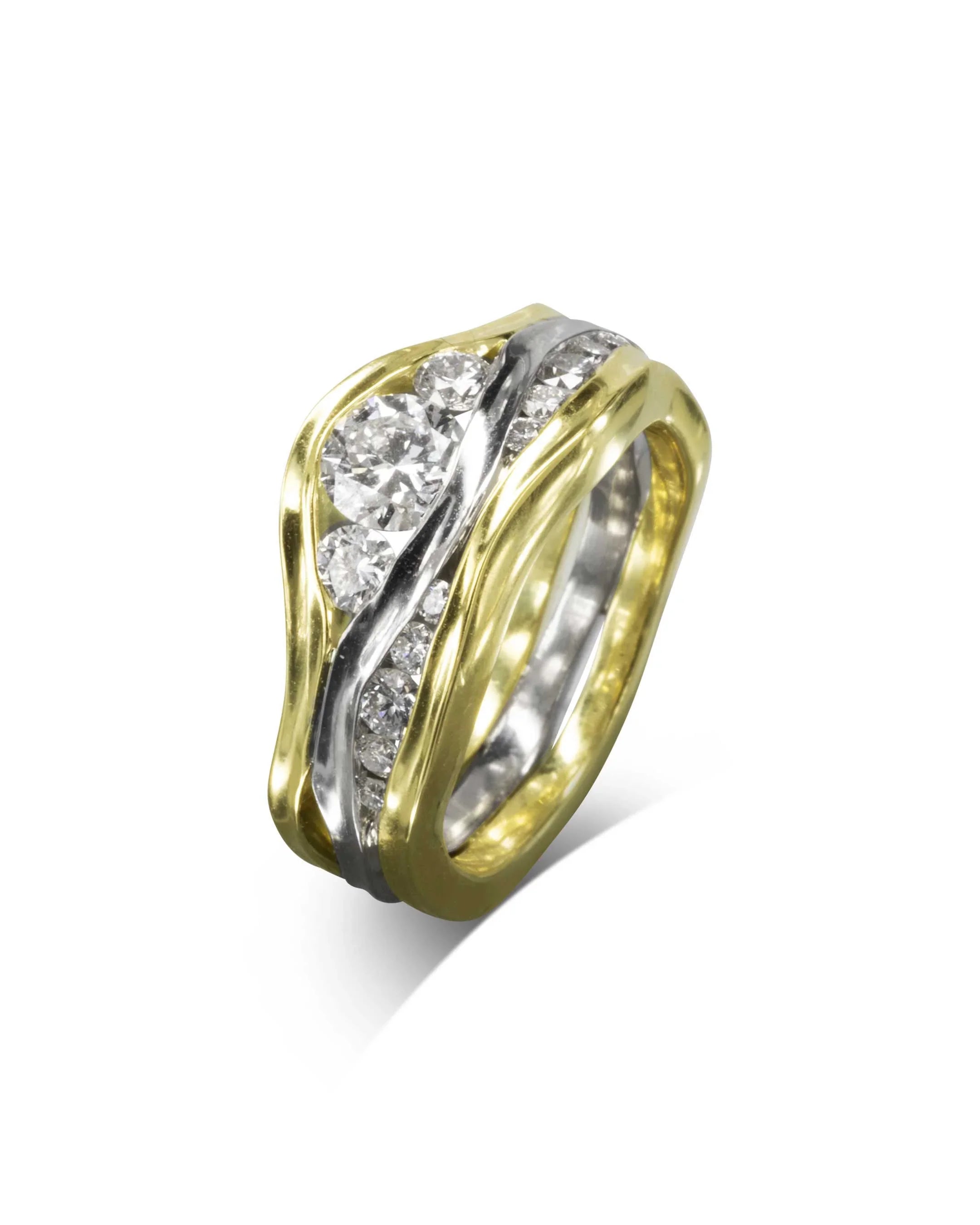 Platinum and 18ct yellow gold three-band trap ring with diamonds.