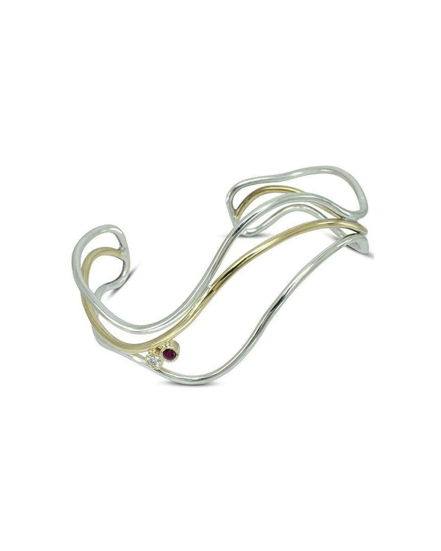 Three-strand asymmetric 9ct solid gold bangle with a ruby and diamond.