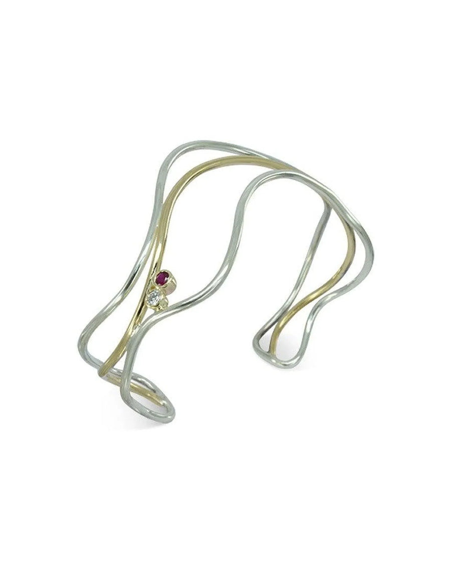 Three strand asymmetric 9ct yellow and white gold bangle with ruby and diamond.