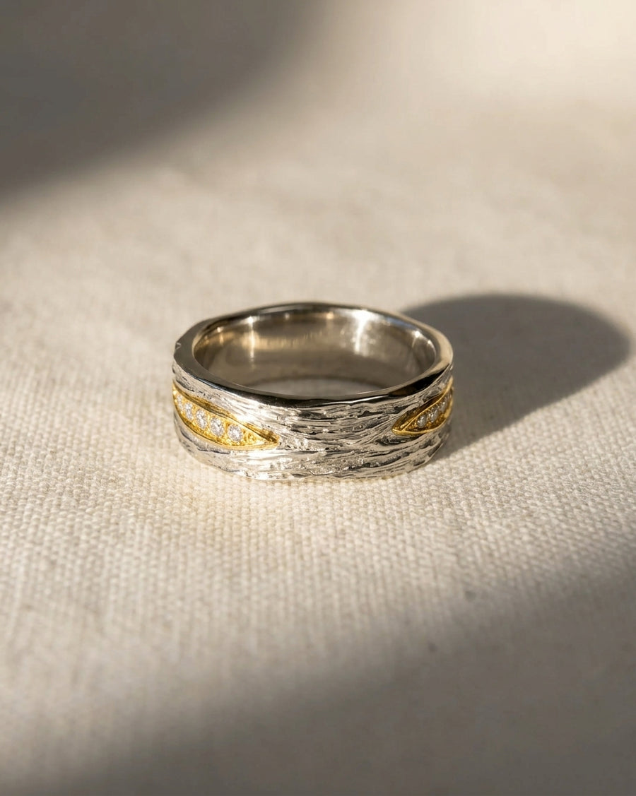 9ct white and yellow gold carved ring with diamonds.