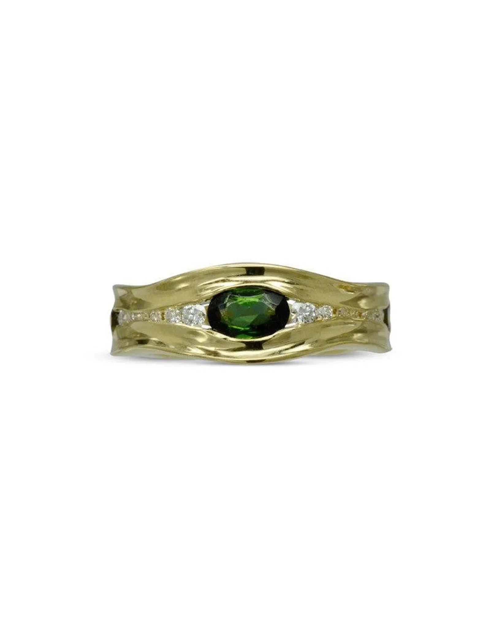 Gold dress ring with a central green tourmaline and small diamonds in an organic setting