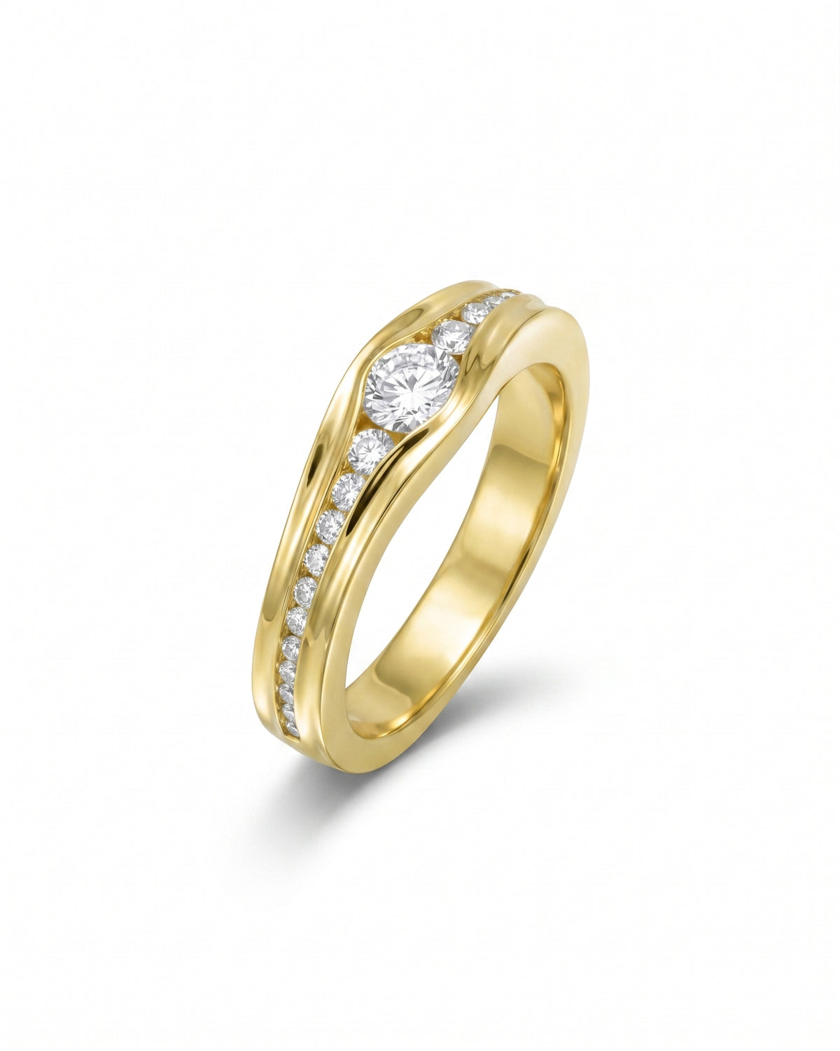 18ct yellow gold engagement ring with a 4mm band and channel-set lab grown diamonds.