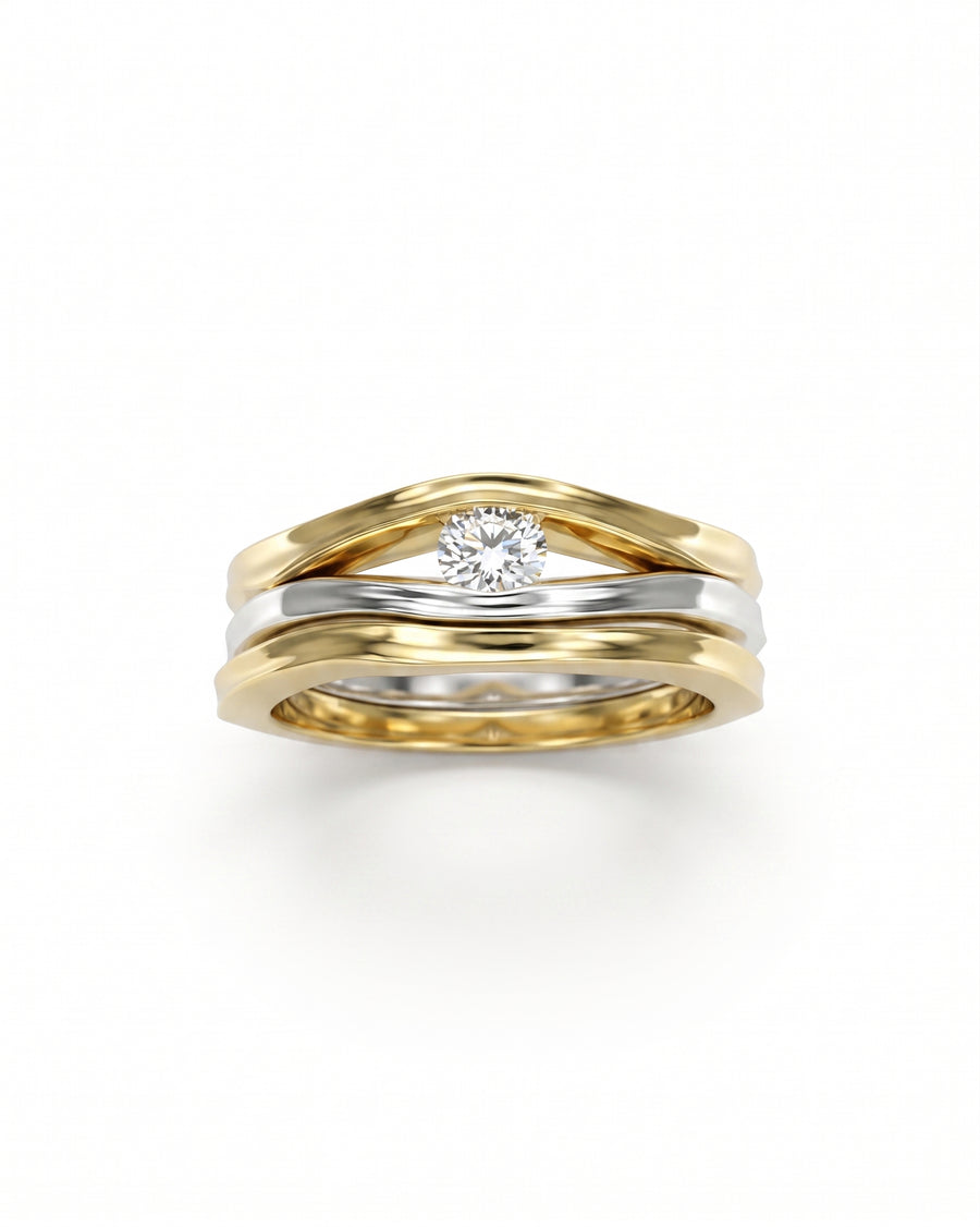 9ct white and yellow gold engagement ring set with a round diamond solitaire.