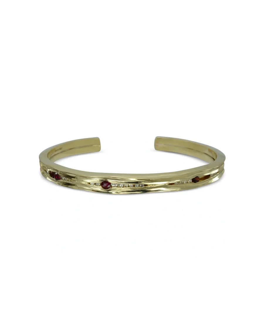 Hammered 9ct gold bangle with rubies and diamonds, handmade with organic textured finish