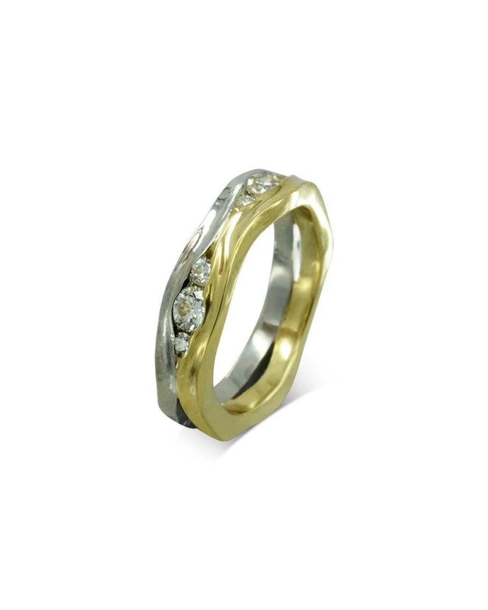 Mixed metal trap ring with three round diamonds.