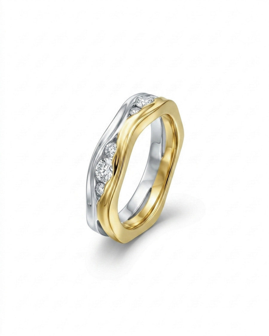 Mixed metal trap ring with diamonds.