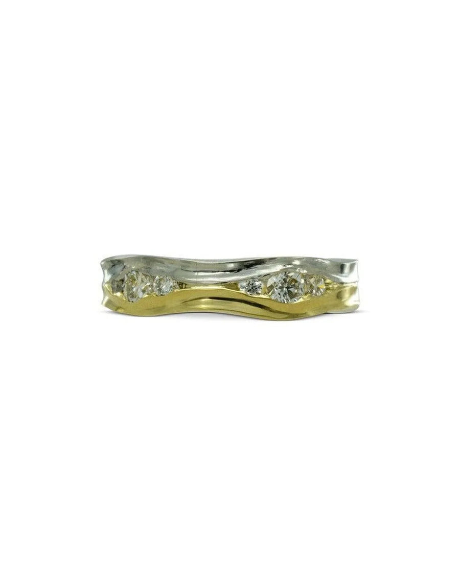 Mixed metal diamond ring with a wavy, two-tone design.