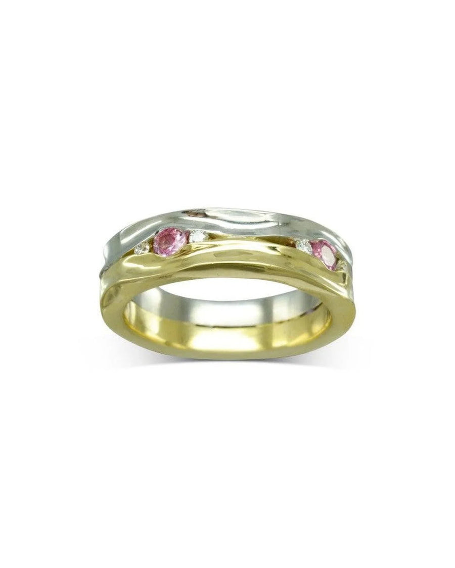 Gold and silver hammered eternity ring with pink sapphires.