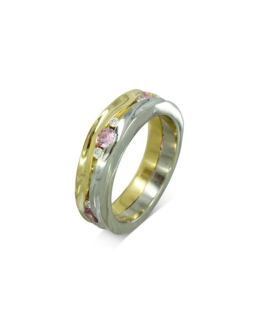 Gold and silver hammered eternity ring with pink sapphires.