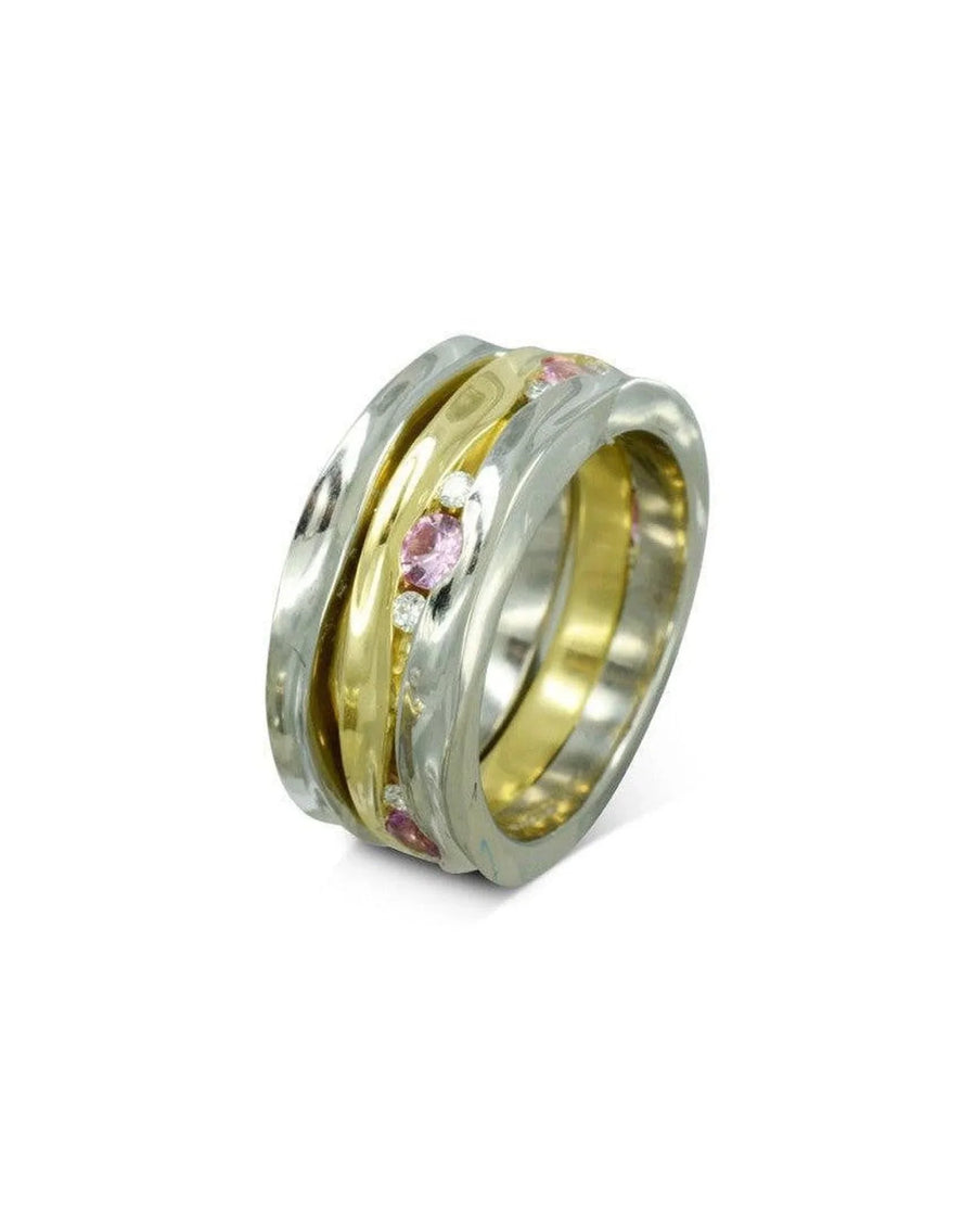 Gold and silver eternity ring with pink sapphires and diamonds.