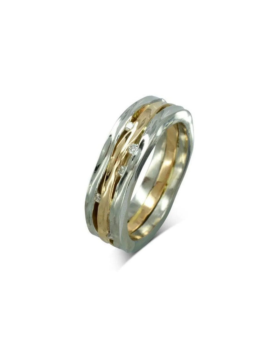 Three-band organic ring in yellow and white gold set with small round diamonds.