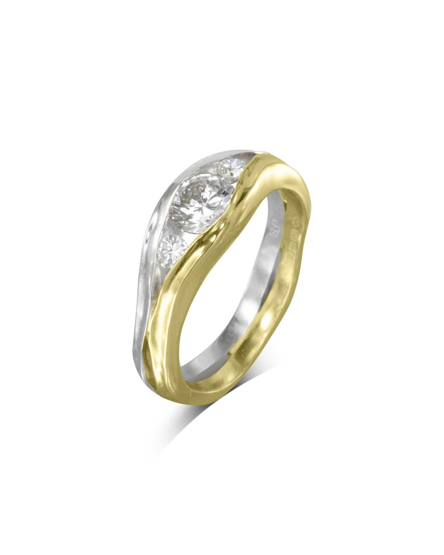 Gold and white gold unusual engagement ring with three round diamonds.