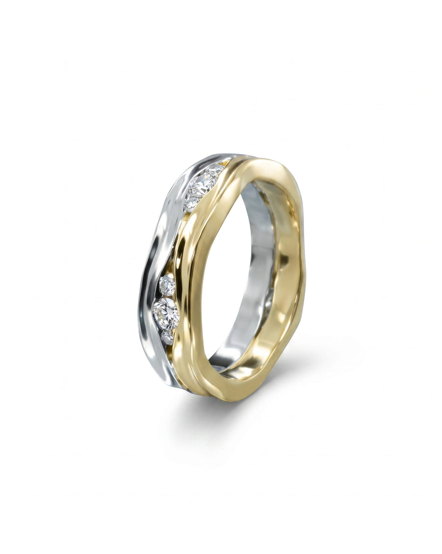 Two-colour gold diamond ring with a wavy, intertwined design.