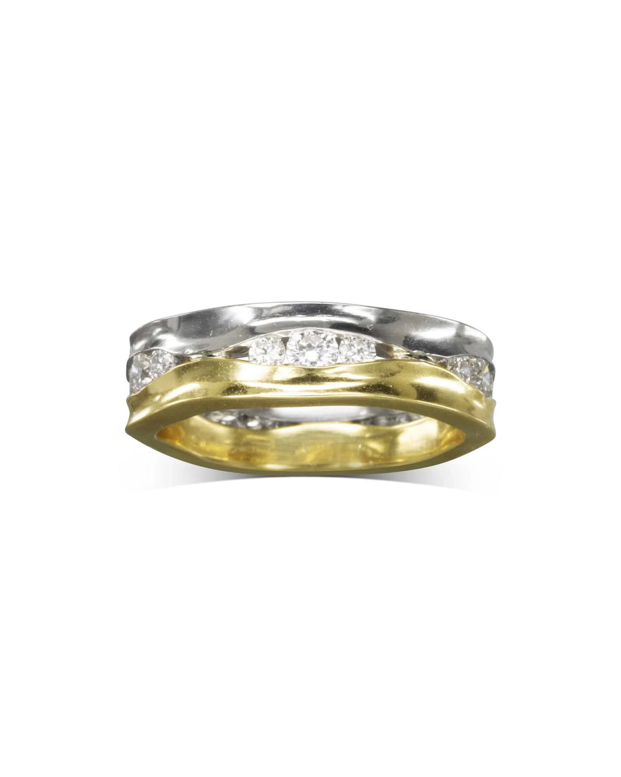 Two-colour gold diamond ring with a wavy, layered design.