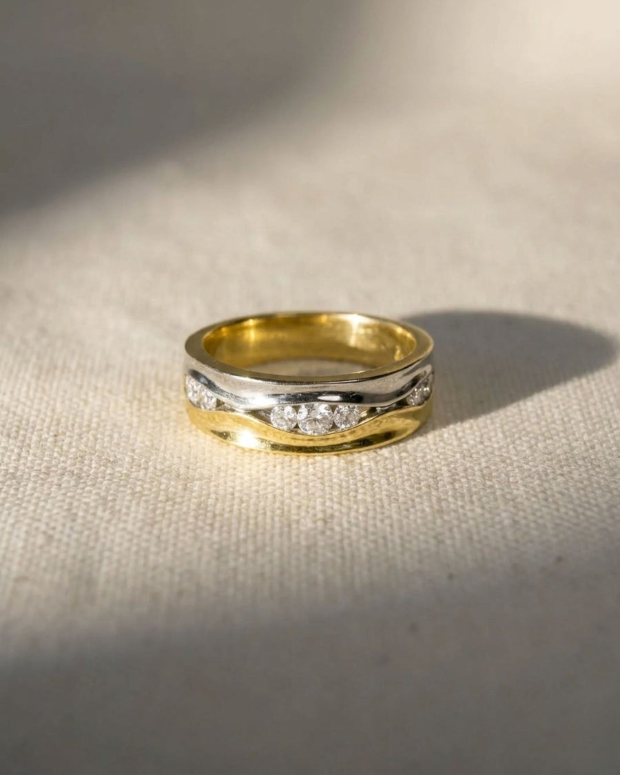 9ct white and yellow gold two-colour ring with five diamonds.
