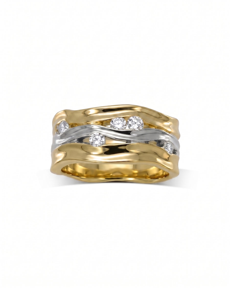 Gold and white gold wide three band diamond eternity ring.